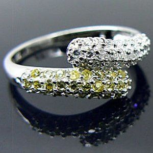 Elegant Silver and Yellow Gemstone Ring